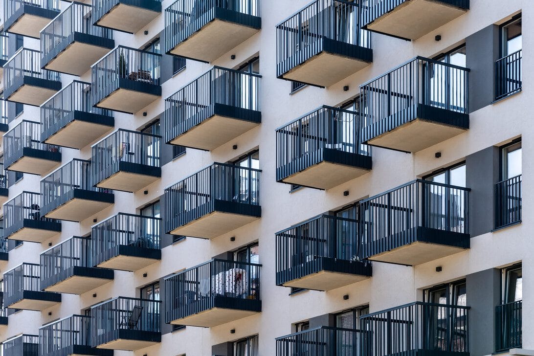 Sareb - Hispamer Noticias Facade of a modern apartment building with repeating blue balconies Hispamer Noticias