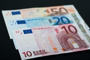 Fanned евро banknotes: 10, 20, and 50 euro bills on a dark surface.&nbsp;Hispamer Noticias